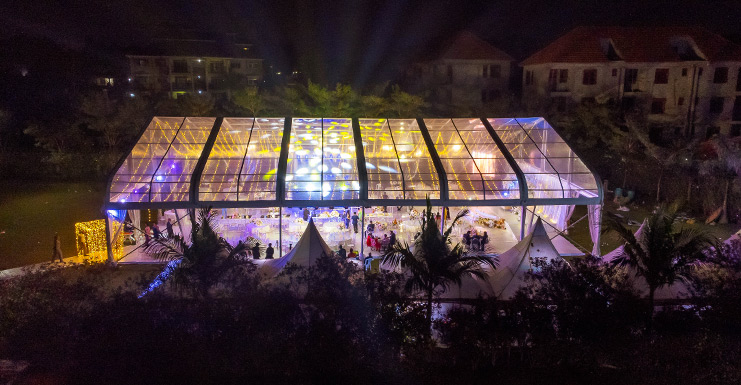 lit-up-transparent-tent-at-night-at-canary-gardens